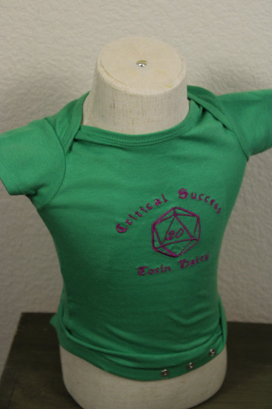 Critical Success – D20 Dice Baby Onesie 🎲✨