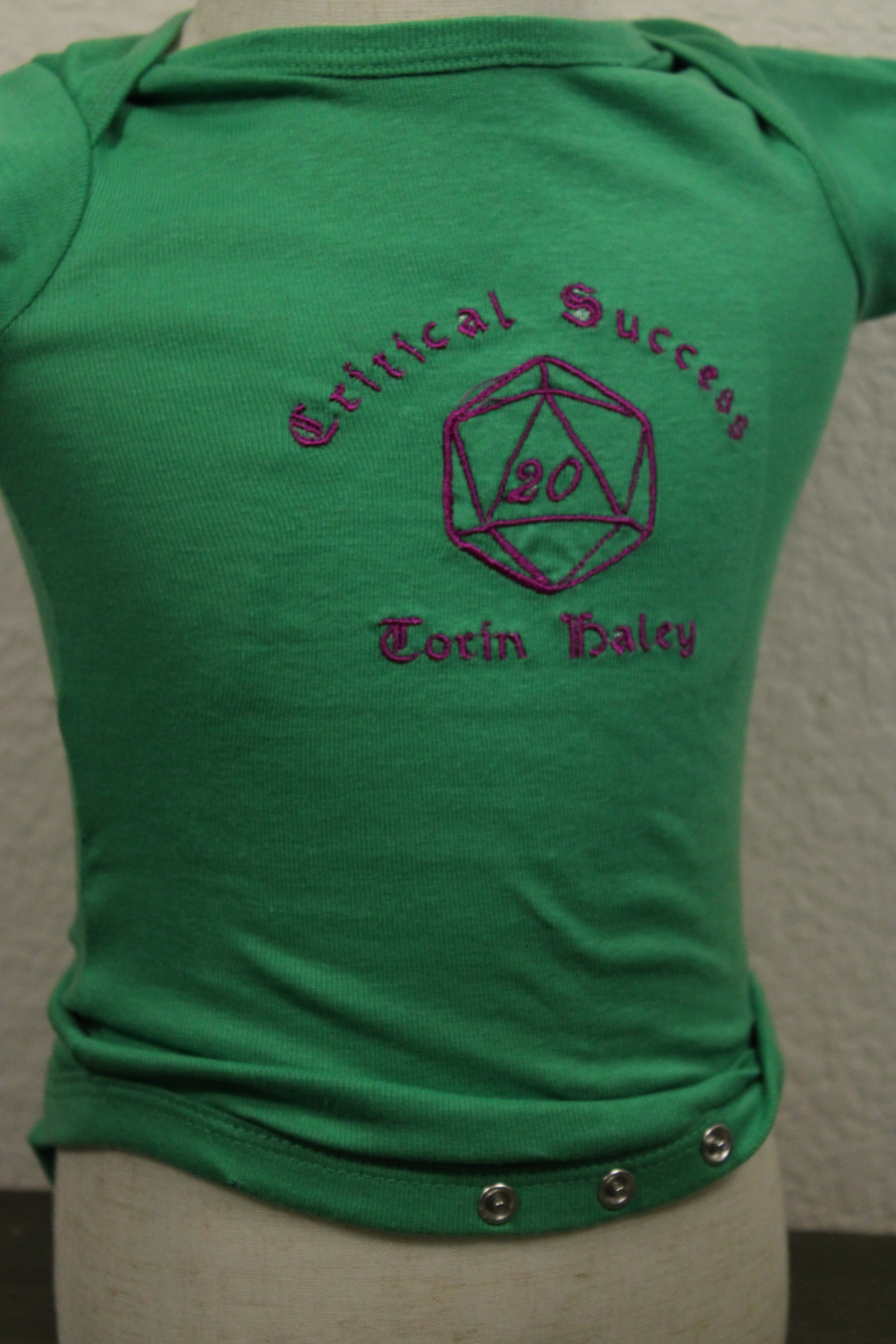 Critical Success – D20 Dice Baby Onesie 🎲✨