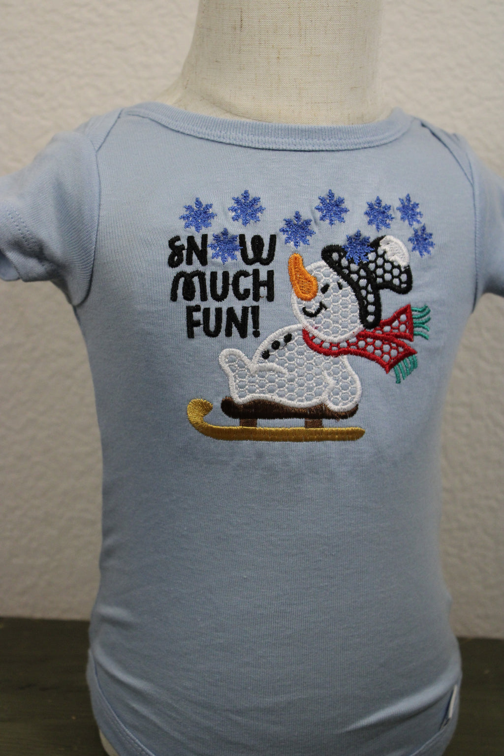 Snow Much Fun – Snowman Sledding Baby Onesie ☃️⛷️